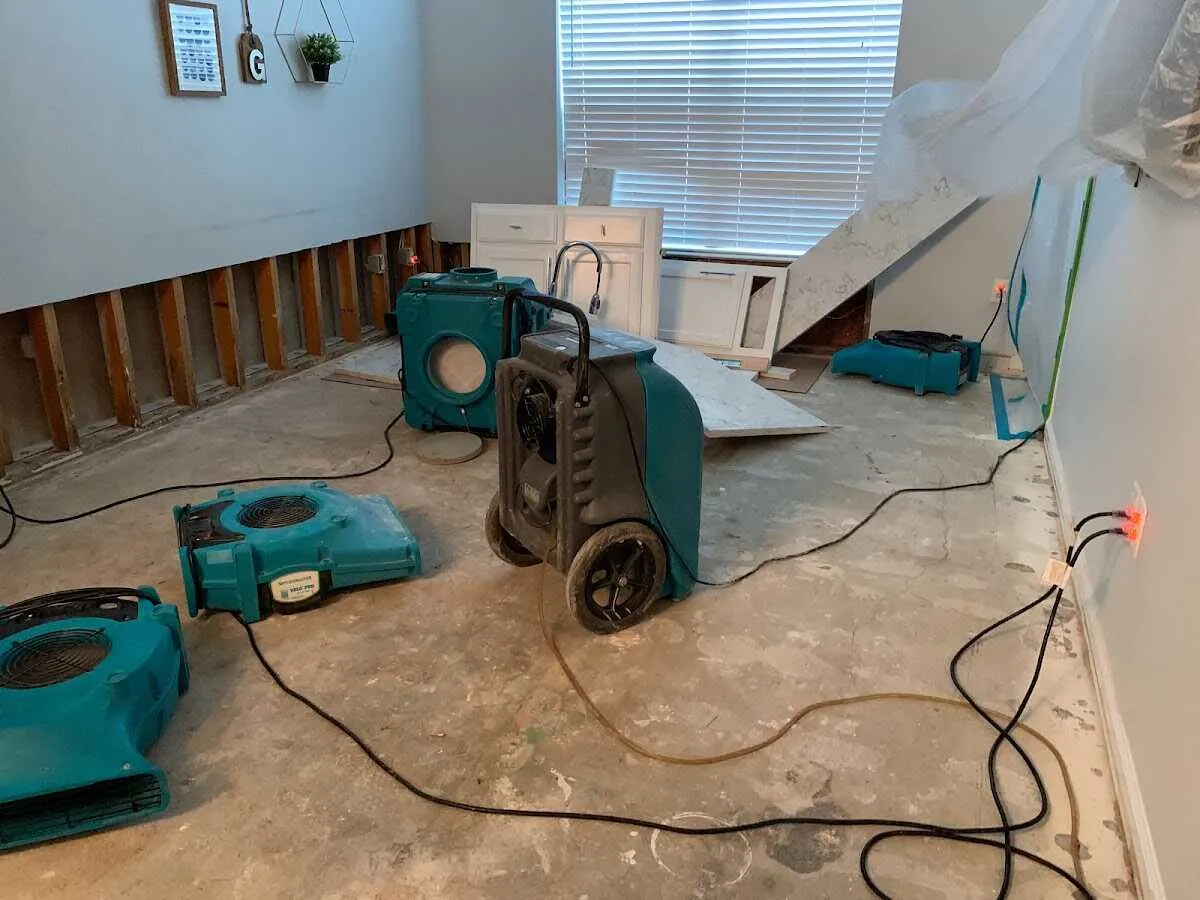 Dehumidifier in flood-cut room for Water Damage Restoration in Pampa